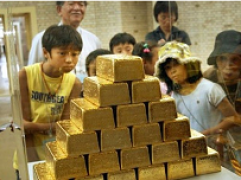 Giá vàng thế giới tăng mạnh, trong nước “dè dặt” hơn
